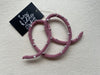 heykiddostudio London Wanddekoration Brezel rosa handgestricktgestrickt