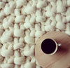 Panapufa Exklusive Merino-Wolldecke in milk