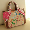 WEAT Schlüsselanhänger Smiley® Drip Berry pink